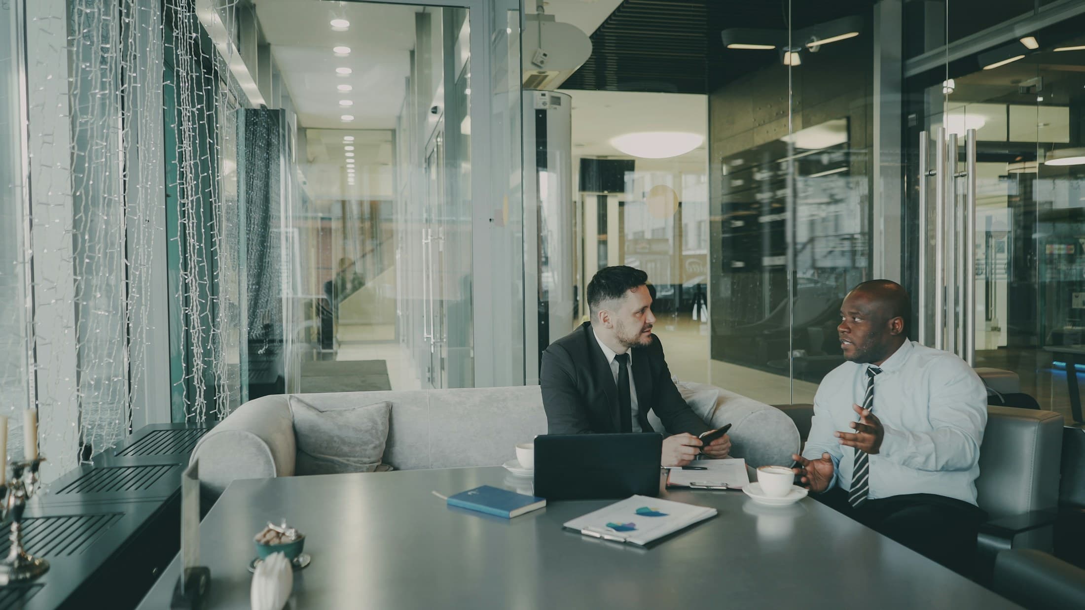 Two professionals discussing a technology project
