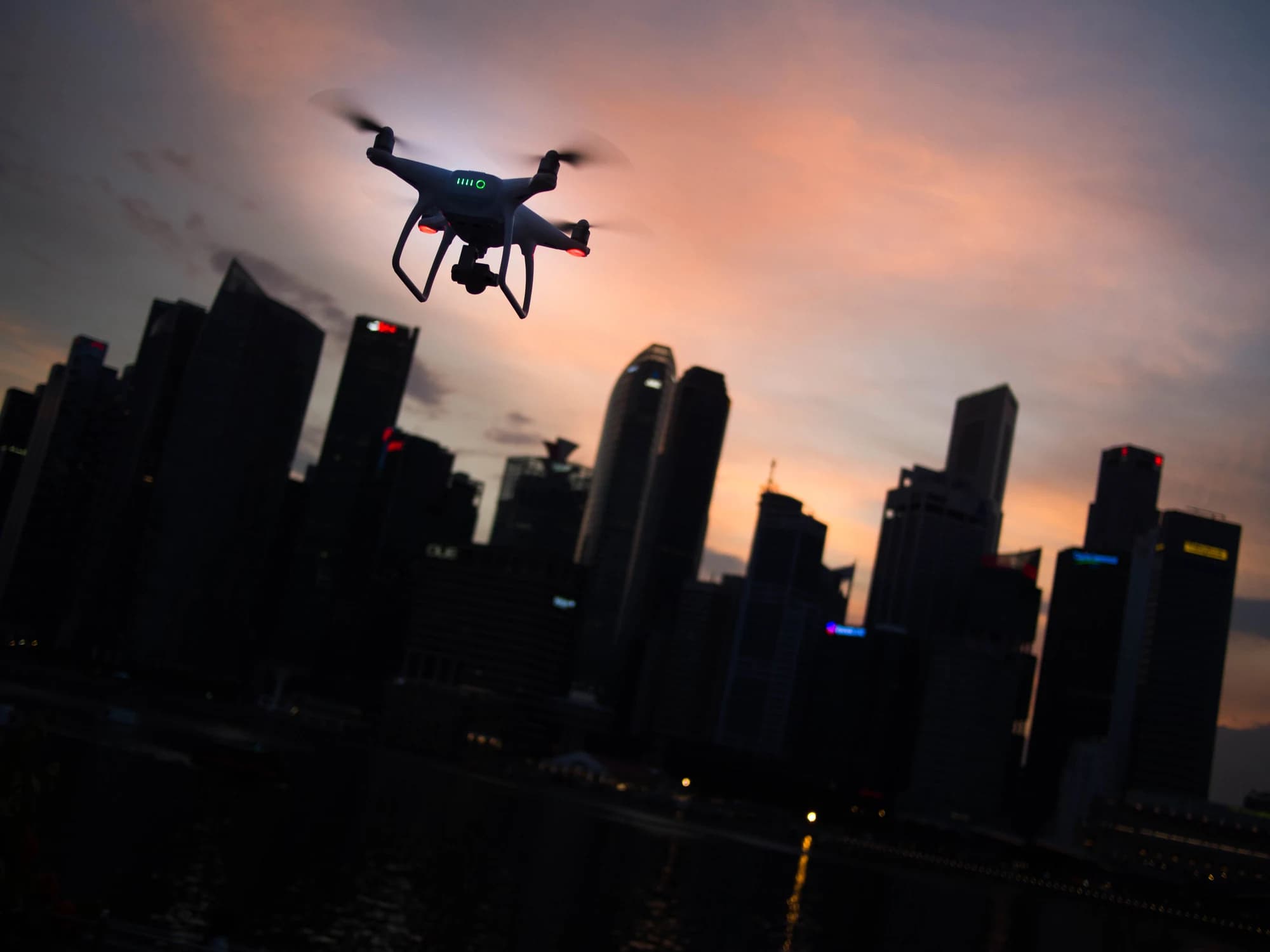 Drone operator deploying an aerial system in the field
